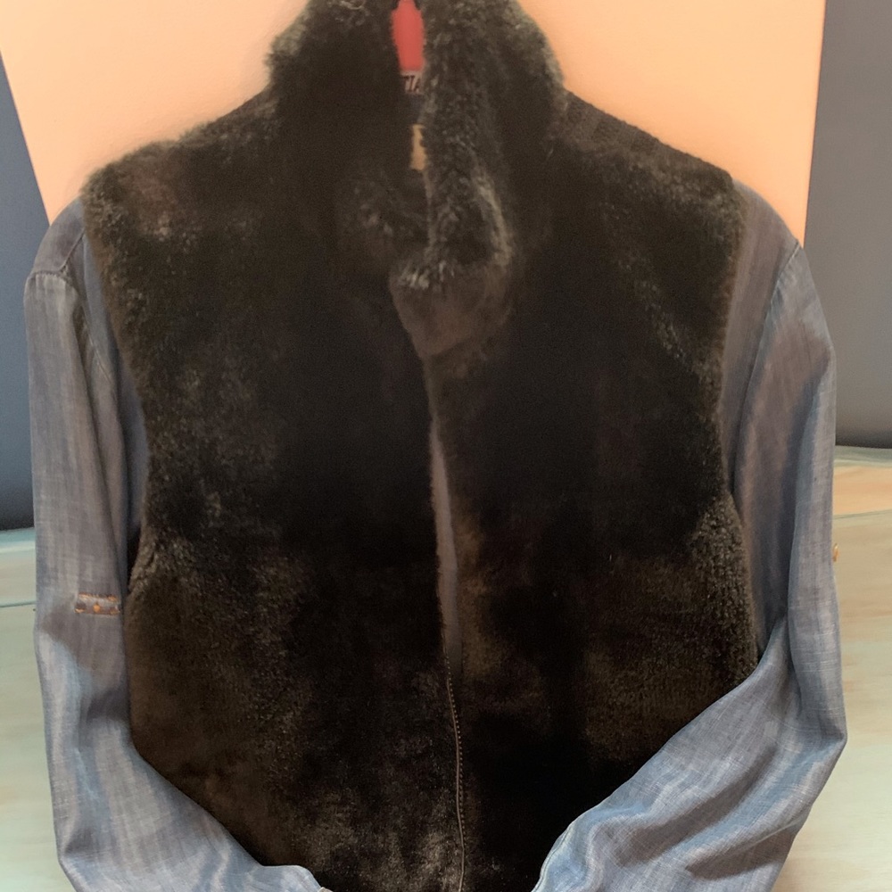Fake fur vest.